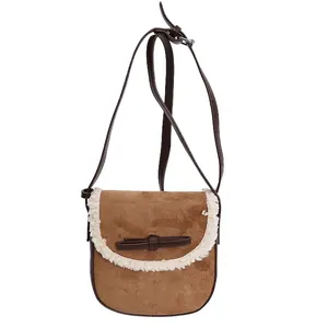 Sacoche marron en daim avec bordure en laine et nœud papillon pour mode féminine sobre