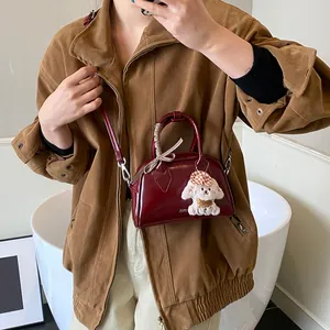 Retro wine red patent leather pillow bag with puppy charm and silk scarf handle