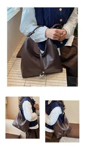 Detailed views of a deep brown faux leather tote bag with silver buckle and shoulder straps