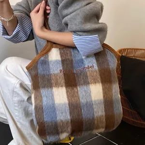 Chic plaid wool tote bag with blue and brown check pattern and embroidered lettering