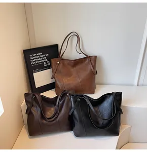 Detailed comparison of brown, coffee, and black tote bags in textured matte PU leather