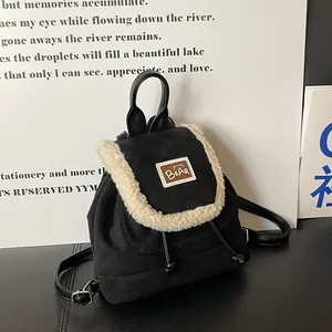 Mini black backpack with fuzzy fleece trim and bear patch for daily stylish casual wear
