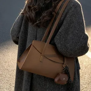 Brown lychee leather shoulder tote bag with mini pouch and chain for casual fashion