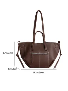 Detailed view of large litchi grain tote bag showing dimensions 36x8x22cm and contrast stitching