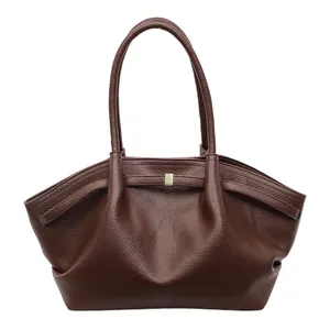 Dark brown textured leather tote bag with gold buckle and long shoulder straps