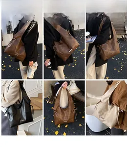 Lifestyle view of large oil wax leather tote bags in dark brown, black, and beige