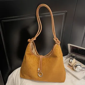 Ginger suede tote bag with large capacity and silver ring detail for daily commute