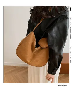 French vintage brown faux suede shoulder bag with a small matching round pouch charm