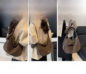 Three-way carry brown suede moon bag shown as shoulder, crossbody and handbag styles