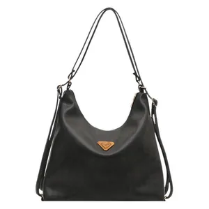 Classic black U-shaped faux leather tote bag with gold triangular plaque and slim strap