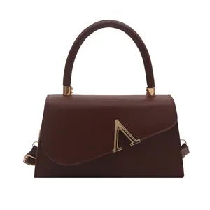 Elegant dark brown handbag with gold A logo and round handle for women