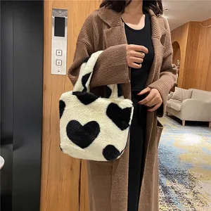 Winter fluffy heart pattern bucket bag with soft plush handles for stylish women