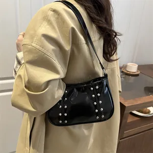 2025 vintage rivet shoulder bag in black patent leather for women's casual style
