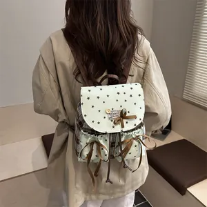 Retro vintage backpack with lace bow and star patterns on textured canvas fabric