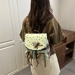 Vintage college style backpack with green star print and brown plaid lace ribbons