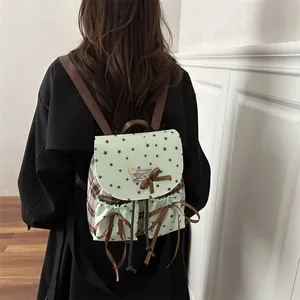 Retro mint green mini backpack with star prints, lace bows and brown plaid side panels