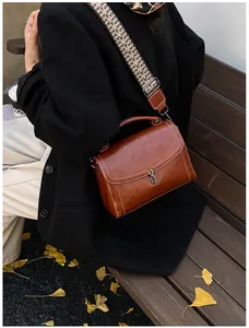 Brown retro leather square bag with white stitching and ethnic pattern wide strap