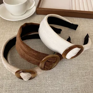 Vintage haarband met schildpadring en geribbelde stof in beige en bruine tinten