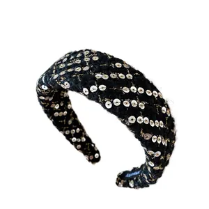 Elegant wide plaid headband in black woven fabric with gold thread and white sequins
