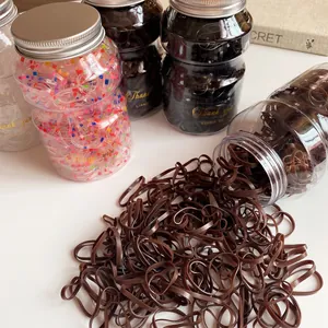 Durable high-elastic hair bands in a plastic jar with assorted colors for kids and women