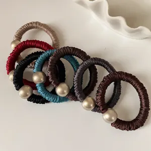 Set de 6 coleteros plisados con perlas en tonos tierra para coletas elegantes