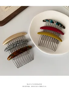 Detailed set of premium acetate hair side combs with elegant patterns and metal teeth