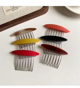 Set of six acetate resin hair side combs in amber and tortoiseshell with metal teeth