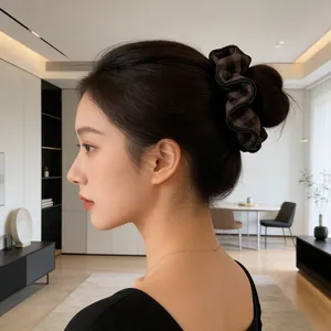 Brown and black plaid checkered oversized scrunchie for elegant bun hairstyles