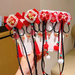 New Year kids bow hair clips with red velvet, tassels, and faux braids for festive outfits