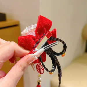 New Year red velvet bow hair clip with faux braids and golden Fu character charms