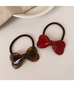 Close-up of double-layer bow hair ties with tortoiseshell pattern and high elastic bands