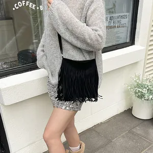 Retro black fringe crossbody bag for women made of matte suede material in street style