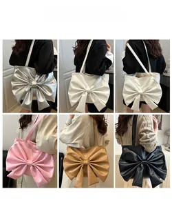 Collage of chic tote bags with bow decoration in silver, white, pink, brown, and black