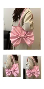 Detail of pink tote bag showing large decorative bow and smooth synthetic leather texture