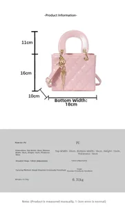 Detailed size chart for pink quilted mini handbag with gold key charm and dimensions