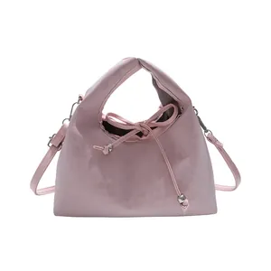 Minimalist soft pink drawstring shoulder bag in premium PU leather with silver beads