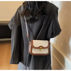 Minimalist vintage contrast color crossbody bag with gold ring buckle and shoulder strap