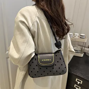 Vintage polka dot underarm bag in grey wool fabric with black leather flap and gold studs