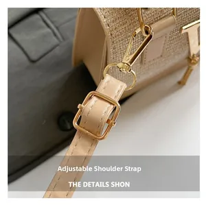 Detail of champagne mini bag featuring adjustable shoulder strap and gold-tone hardware
