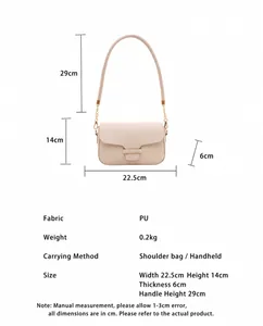 Detail showing dimensions of beige PU leather shoulder bag with gold chain link straps