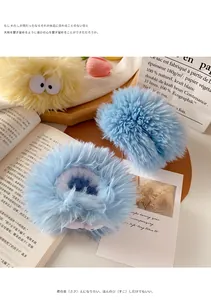 Macro detail of plush absorbent wristbands for washing face in blue and yellow colors