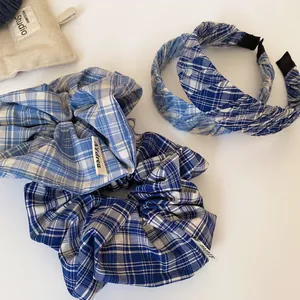 Three-piece set of blue and white checkered hair scrunchies and twisted headband for women