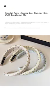 Detail view of floral sponge headband showing the 3cm width and handmade inner label