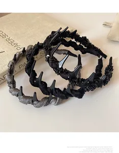 Close-up of three stylish mesh bubble lace headbands with sequin and bead accents
