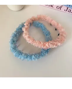 Détails de serre-têtes en maille rose et bleue à volants avec dents antidérapantes