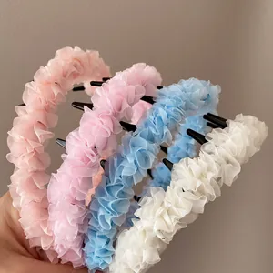 Serre-têtes plissés pour enfants avec dents en couleurs rose bleu et beige doux