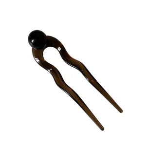 U-shaped minimalist tortoise shell hair pin with black bead for elegant bun styling