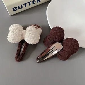 Cute cream and coffee bow hair clips set with textured fabric for women's hair styling