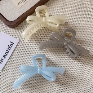 Elegant bow hair claws set in matte cream grey and blue for women accessories