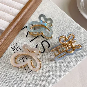 Lot de trois pinces à cheveux papillon en acétate avec dégradé de couleurs irisées